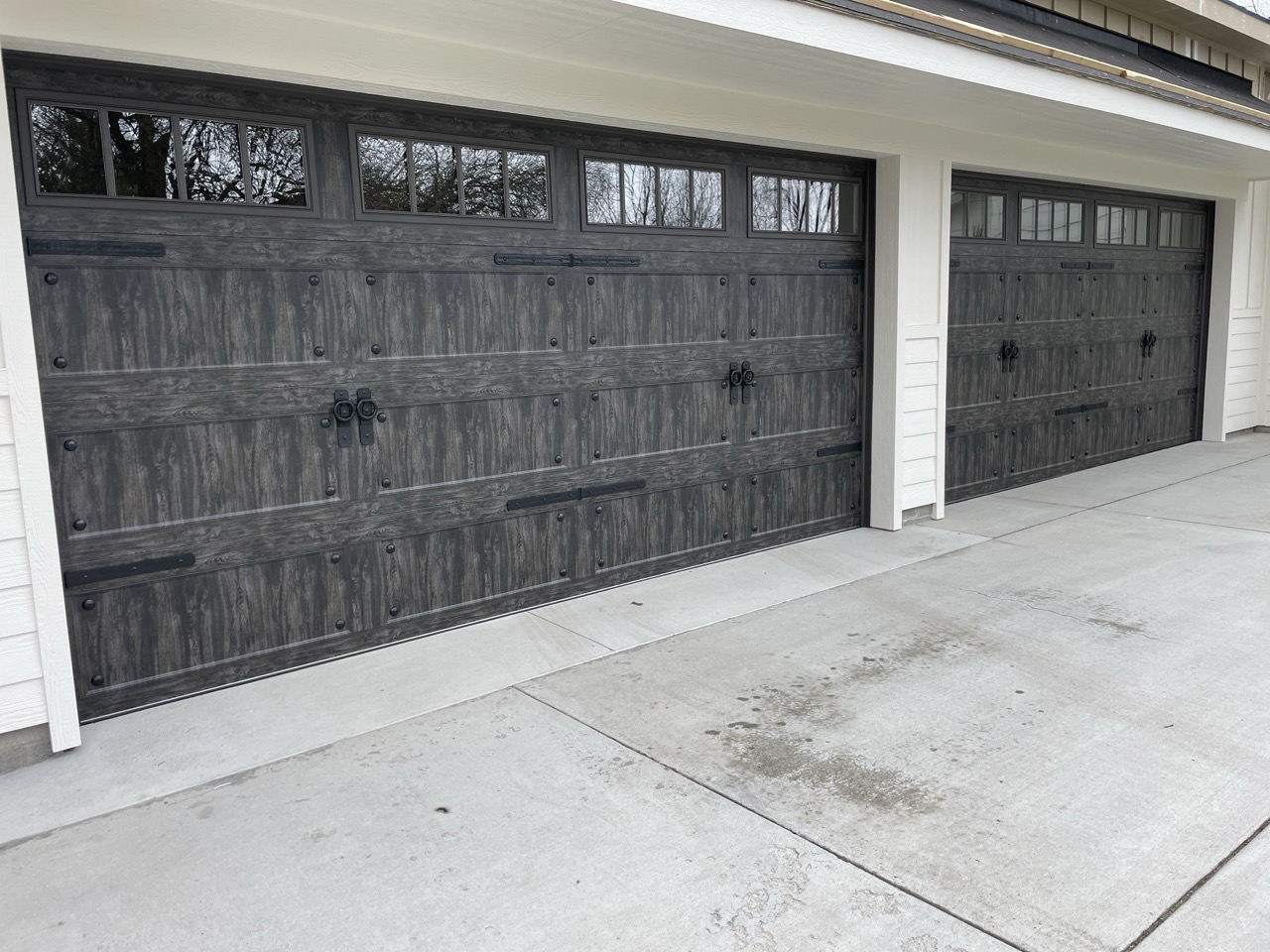 Weathered gray carriage door installation
